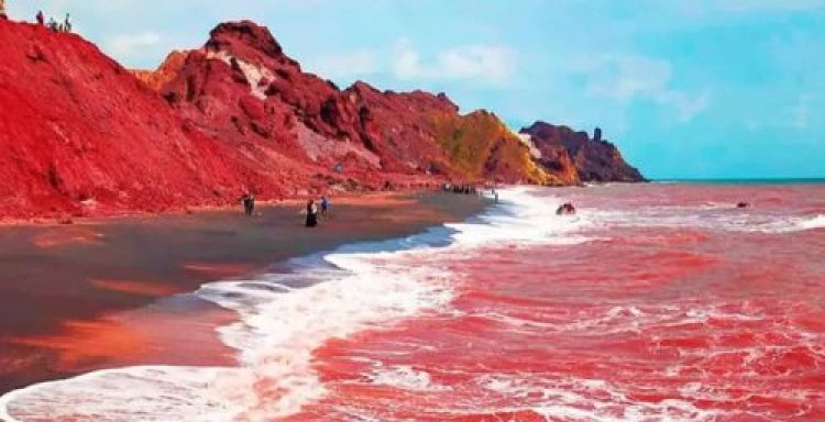 Heavy Rain Turns Iran’s Hormuz Island Shoreline Deep Red