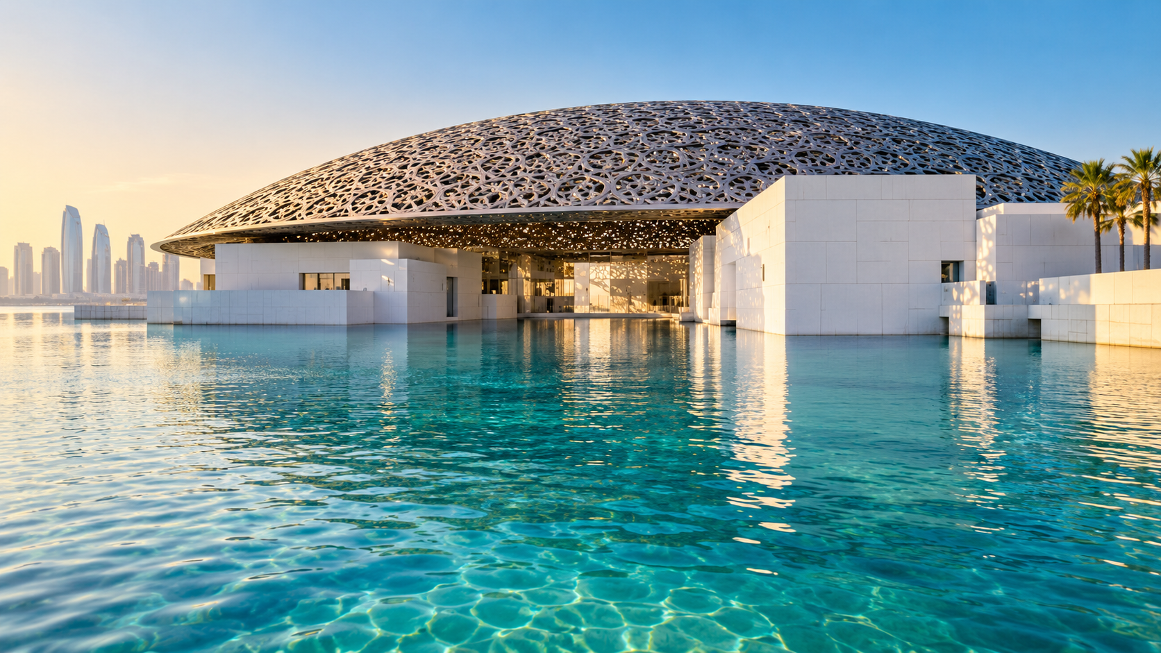 Museum dome and white waterfront buildings in warm sunlight