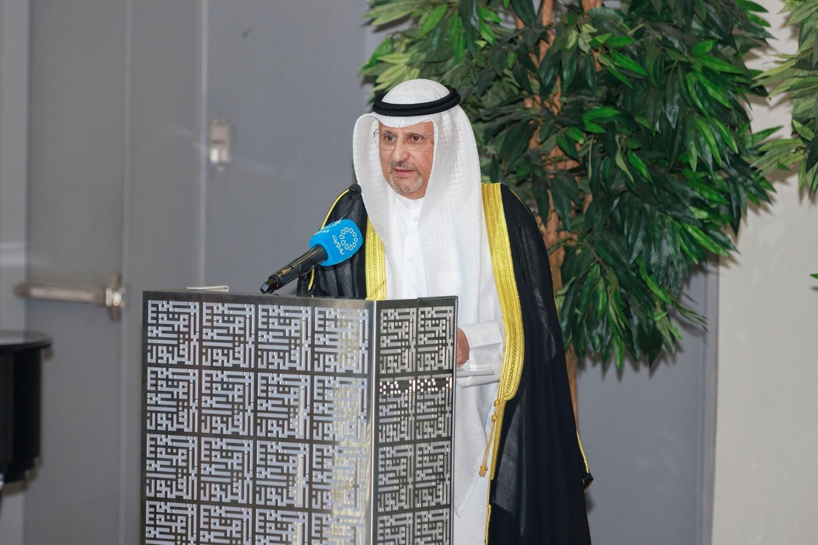 Omar Al-Omar speaking at the opening of the mosque exhibition in Kuwait
