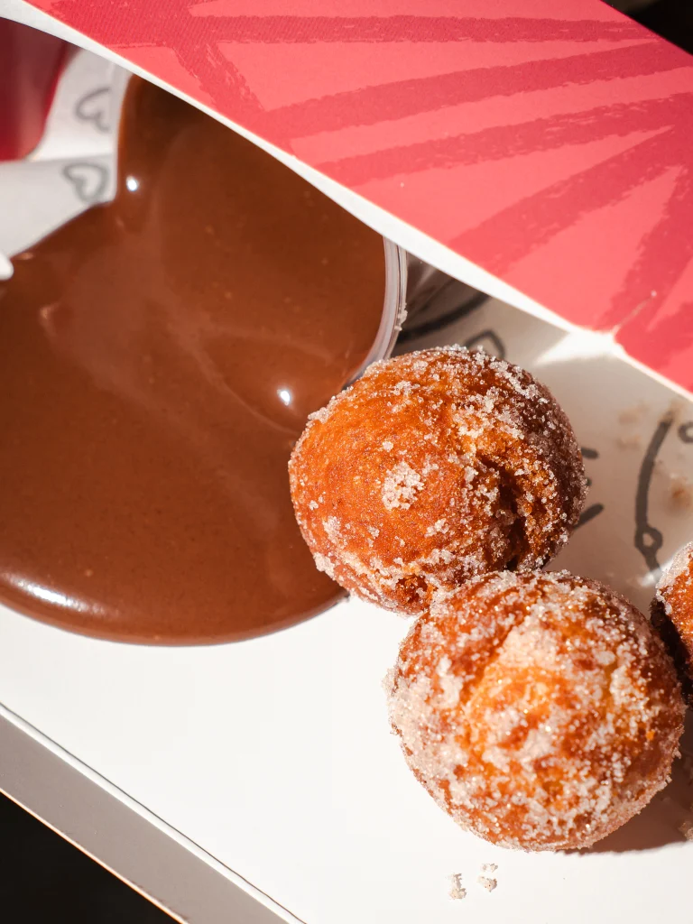 DŌ doughnuts served with dipping sauce