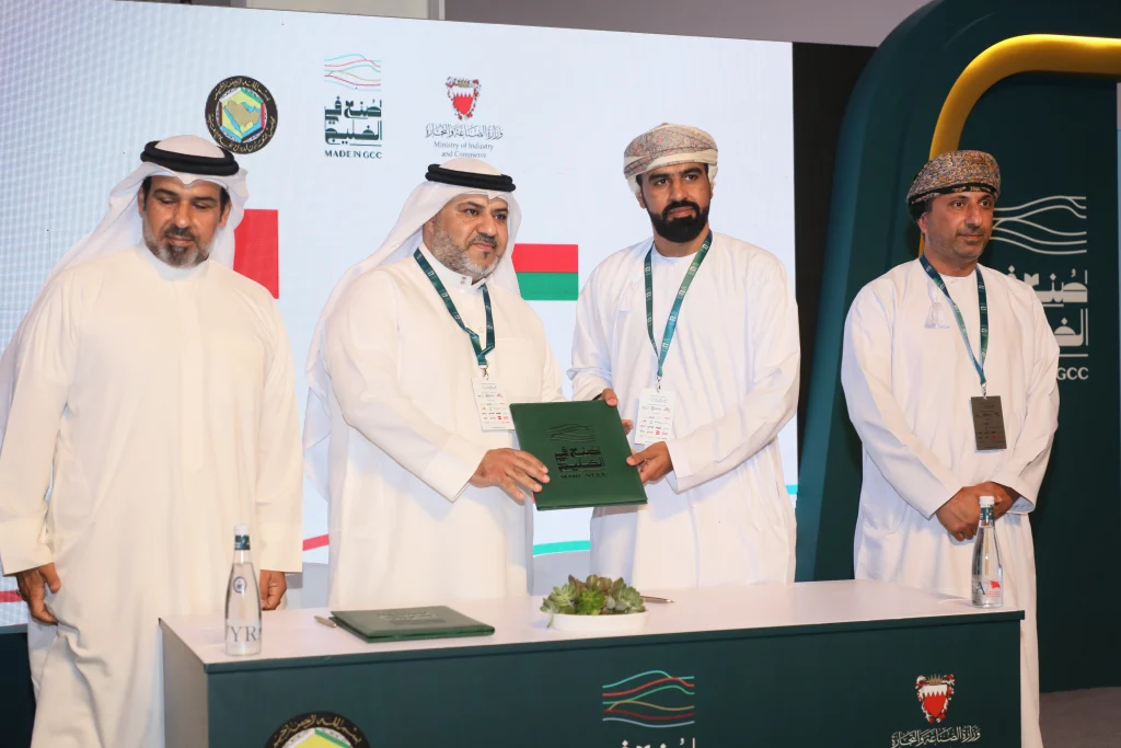 Sohar Porcelain and Abdulaziz Khalil representatives display their signed agreement