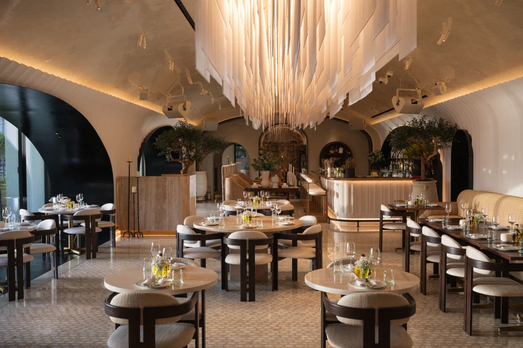 Set dining tables and sculptural ceiling details at Avli by tashas Bahrain