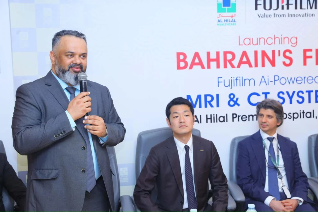 A speaker addresses guests at the Al Hilal and Fujifilm imaging launch