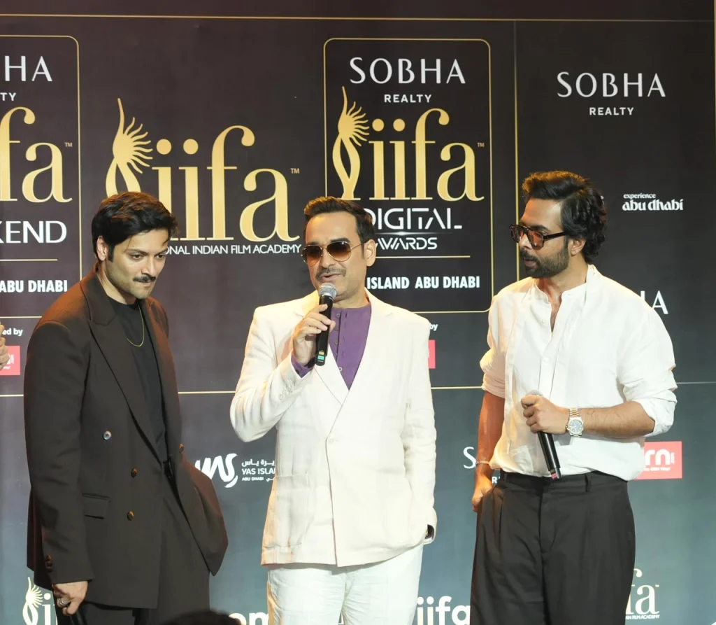 The three announced IIFA Digital Awards hosts speaking at the press conference