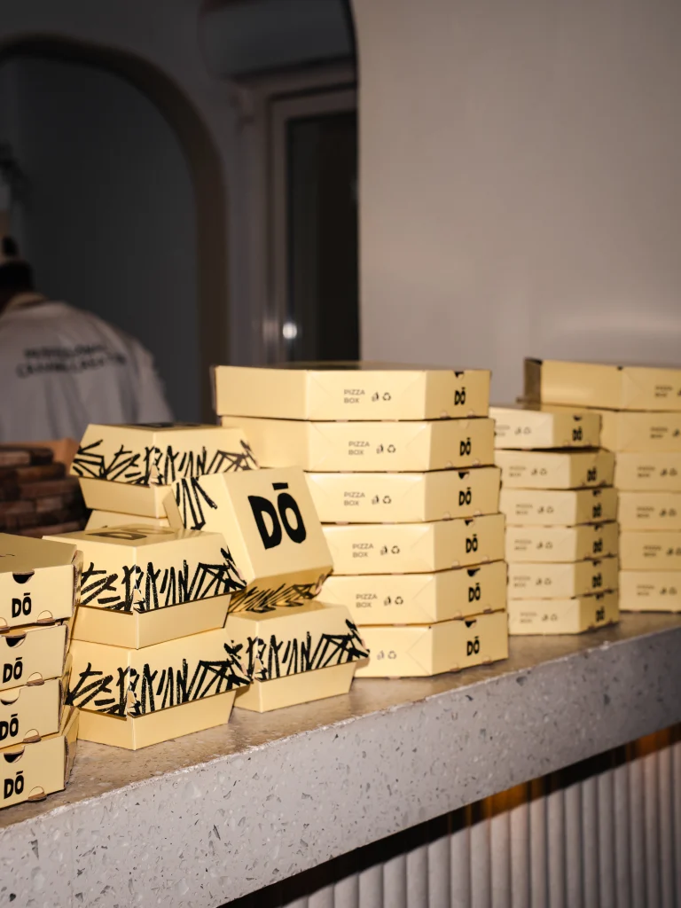 DŌ branded food packaging displayed at the launch