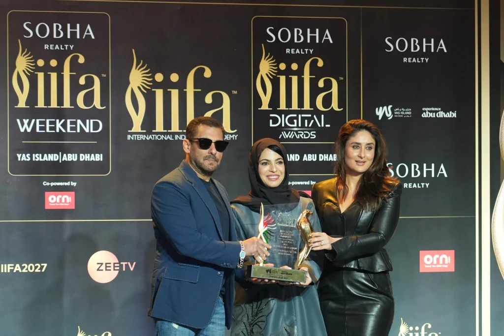 Guests posing with an IIFA presentation at the Mumbai launch