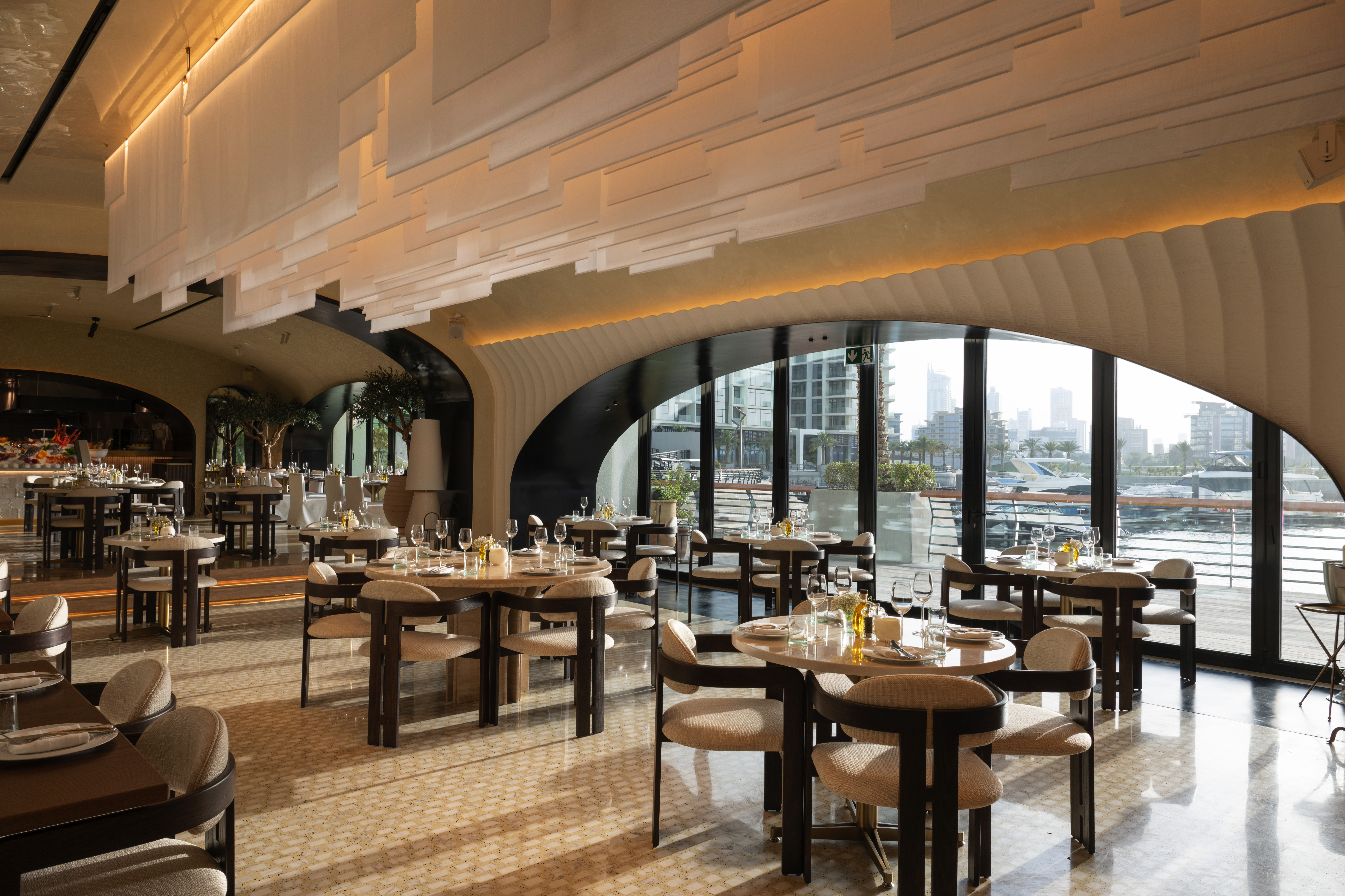 Dining room at Avli by tashas Bahrain overlooking the harbour
