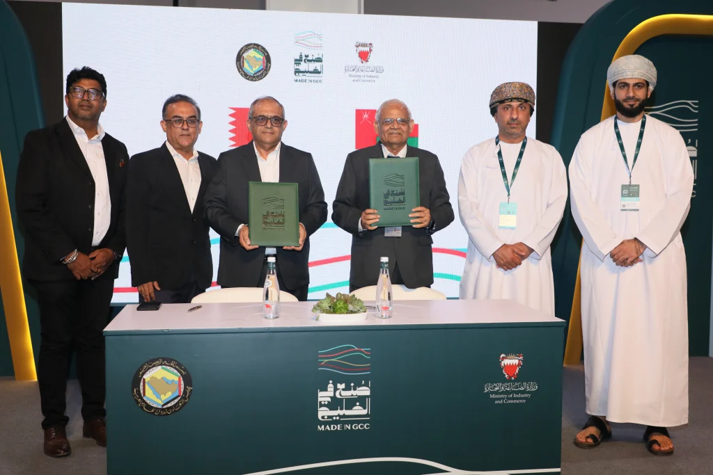 Representatives of Reem Batteries and UCA holding the signed documents at Made in GCC 2026