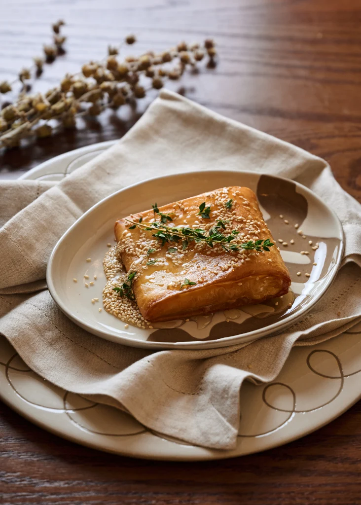 Phyllo-wrapped feta saganaki served with honey and thyme