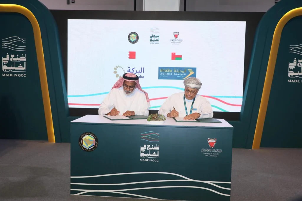 Al Madina Logistics and Al Baraka Logistics representatives at their MoU signing