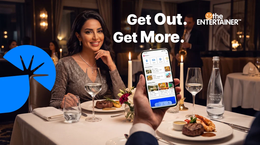 A restaurant dining scene in the ENTERTAINER Bahrain campaign artwork