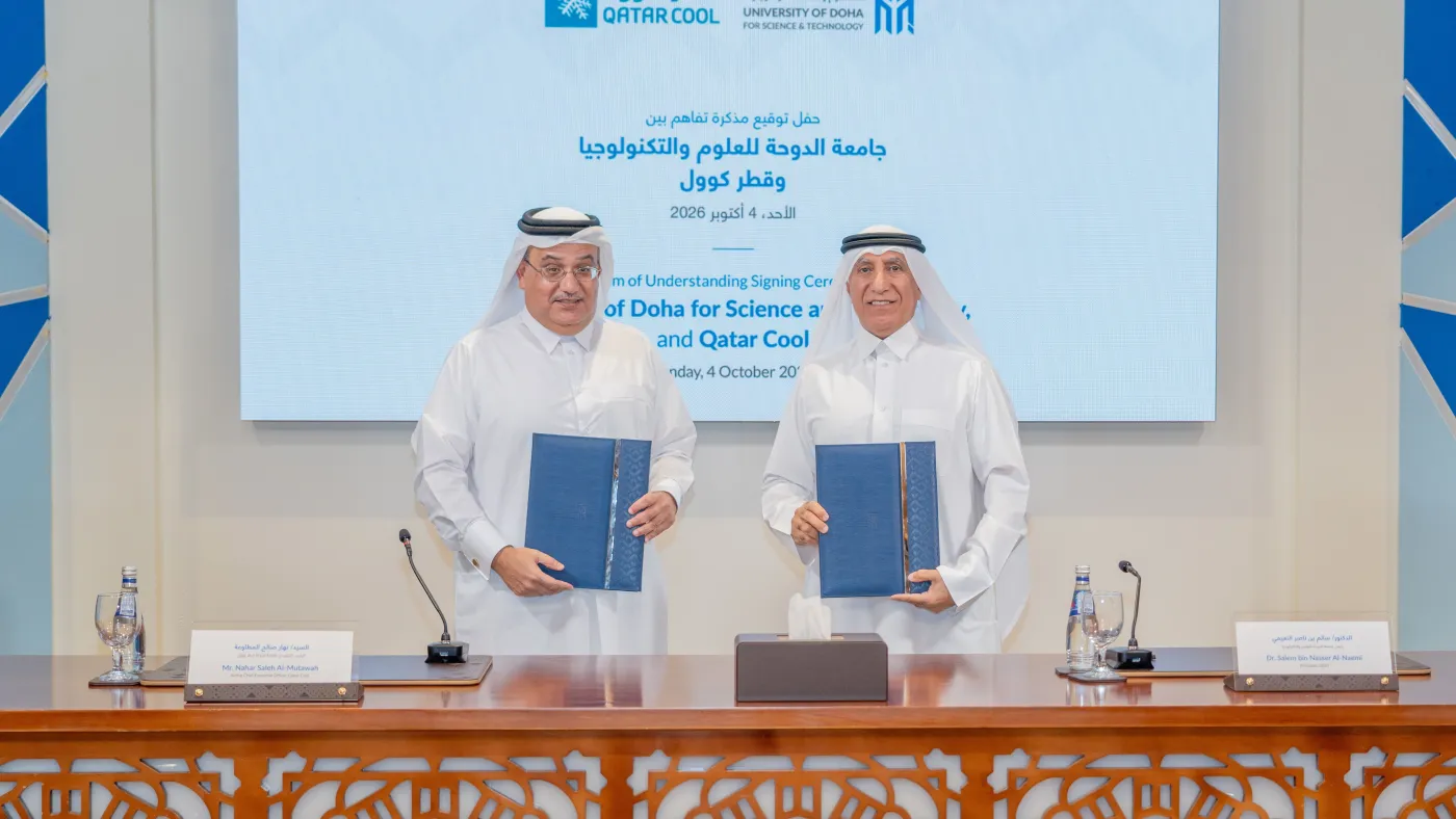 UDST and Qatar Cool representatives display the signed agreement