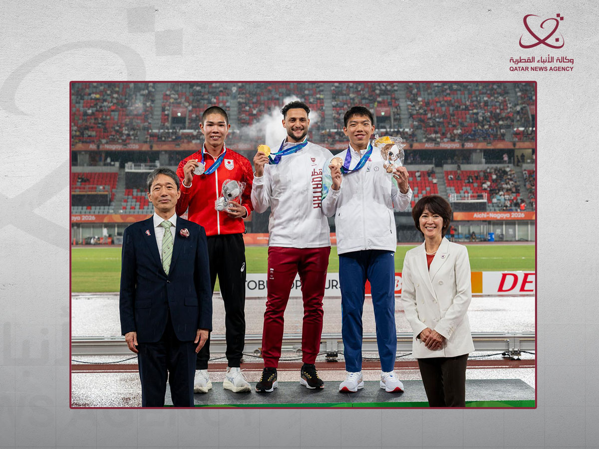Athletes on a medal podium at the Aichi-Nagoya Asian Games