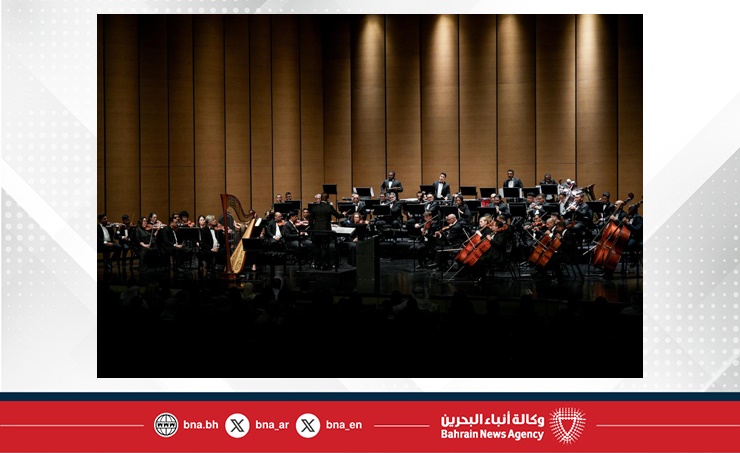 Bahrain Philharmonic Orchestra performing on stage at Bahrain National Theatre.